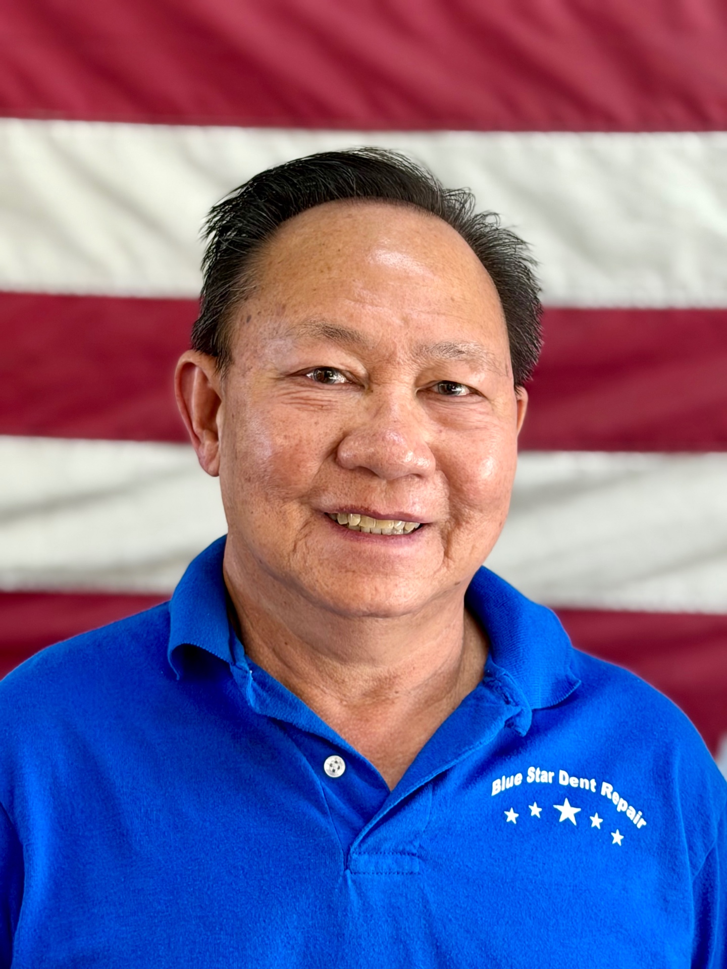 Thongsy Hiampane, owner and lead technician at Blue Star Dent Repair in Arvada